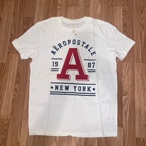 Men T-Shirt. White. Size: Medium. Never worn!